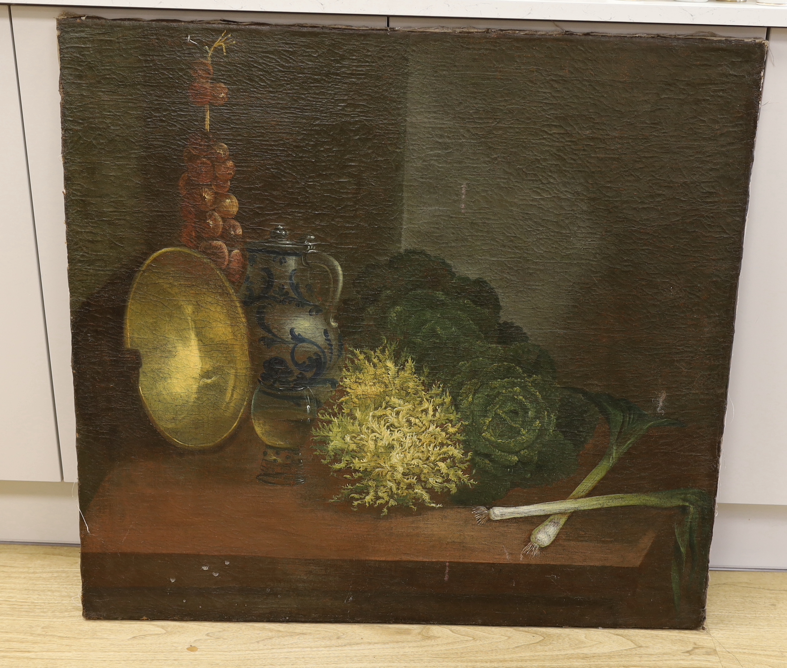 19th century Continental School, oil on canvas, Still life of vegetables, a faience flagon and a rummer, 86 x 93cm, unframed